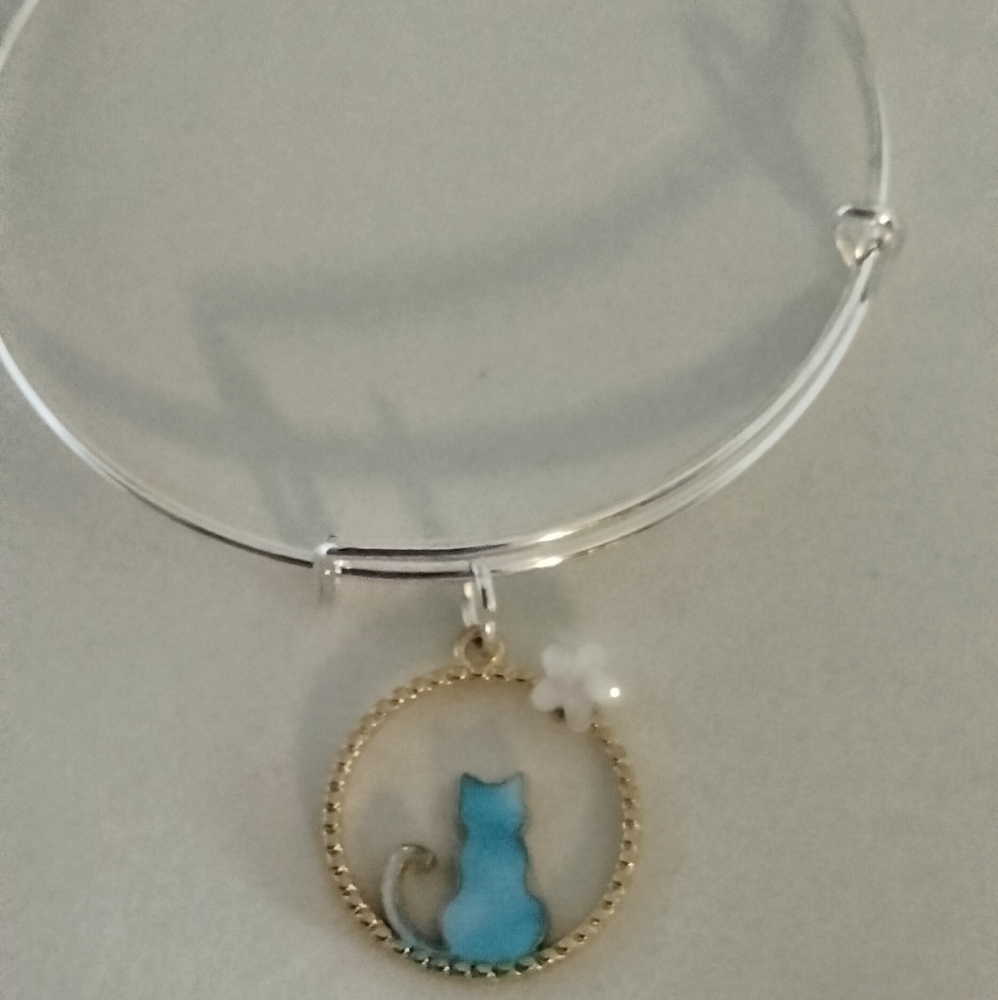 Blue cat on a silver bracelet